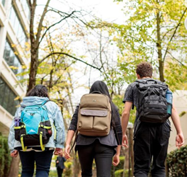 students walk in the Park Blocks at Portland State University